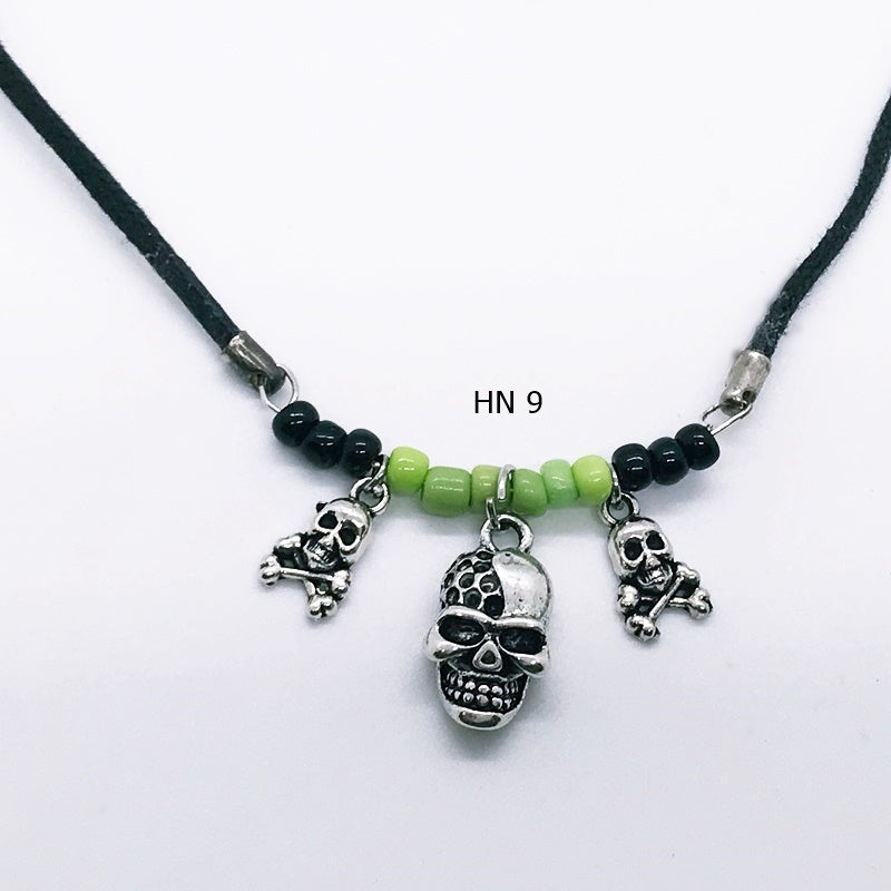 Handcrafted Black and Green Halloween Skulls Necklace